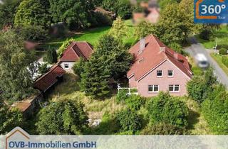 Haus kaufen in 26817 Rhauderfehn, Wohnhaus mit zwei Wohneinheiten und Doppelgarage in Holte