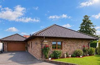 Haus kaufen in 26529 Wirdum, Ruhe trifft Wohnkomfort!Sehr gepflegter L-Bungalow mit Doppelgarage, 3 Terrassen und herrlichem Fe