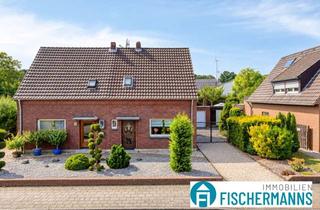 Doppelhaushälfte kaufen in 47509 Rheurdt, Doppelhaushälfte mit Doppel Garage und großen Grundstück in Zentraler Lage von Rheurdt