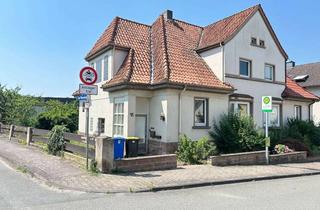 Doppelhaushälfte kaufen in 34414 Warburg, Charmante Doppelhaushälfte mit großem Grundstück, Garten und Garagen in Warburg