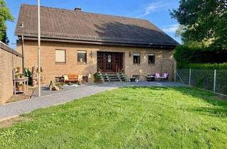 Mehrfamilienhaus kaufen in 59602 Rüthen, Mehrfamilienhaus-Domizil: Viel Platz & nachhaltige Holzpelletheizung!