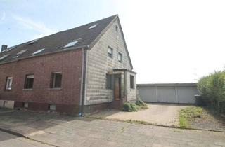 Haus kaufen in 52382 Niederzier, Ein-/ Zweifamilienhaus mit unverbaubarem Feldblick, vielseitigen Nutzungsmöglichkeiten und 3 Garagen