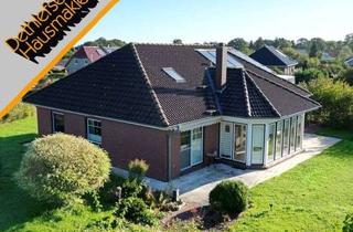 Haus kaufen in 25729 Windbergen, Verkauf eines Walmdachbungalows mit Wintergarten und Garage in Sackgassenlage in Windbergen bei Meld