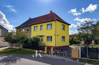 Haus kaufen in 01979 Lauchhammer, Ihr neues Zuhause mit Entfaltungsmöglichkeiten: Solides Doppelhaus mit Garten und Nebengelass