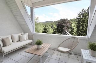Wohnung kaufen in 76530 Innenstadt, Attraktive Maisonette auf zwei Ebenen mit sonniger Loggia