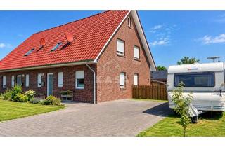 Haus kaufen in 26842 Ostrhauderfehn, Zwei Wohneinheiten unter einem Dach – vermietetes Zweifamilienhaus aus 2016 in Ostrhauderfehn!