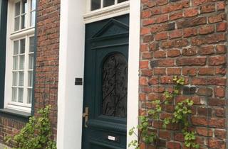 Haus kaufen in 46414 Rhede, Liebhaberimmobilie im Rheder Stadtkern mit drei Wohnungen und viel Platz