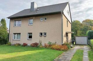 Haus kaufen in 51379 Opladen, Freistehendes Zweifamilienhaus mit großem Grundstück in ruhiger Lage