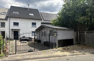Einfamilienhaus kaufen in 54421 Reinsfeld, Charmantes Einfamilienhaus in Reinsfeld – Solide und teilmodernisiert