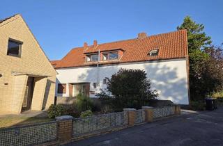 Wohnung kaufen in 28777 Rönnebeck, Erdgeschosswohnung mit großer Terrasse im Dreiparteienhaus in Rönnebeck