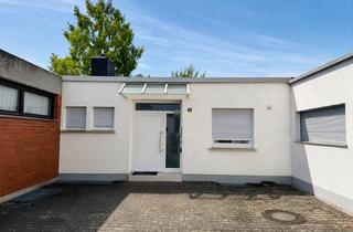 Haus kaufen in 68526 Ladenburg, Flachdachbungalow in ruhige Wohnlage in der beliebten Südstadt von Ladenburg