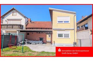 Haus kaufen in 65474 Bischofsheim, Viel Platz für die Familie – Modernisiertes Ein-/Zweifamilienhaus mit großem Garten in Bischofsheim