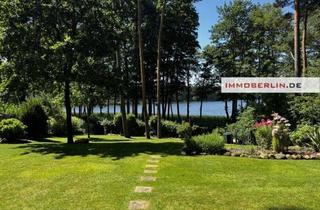 Haus kaufen in 16835 Lindow (Mark), IMMOBERLIN.DE - Traumhafter Wasserblick! Moderner Bungalow mit Südwestgarten am Werbellinsee