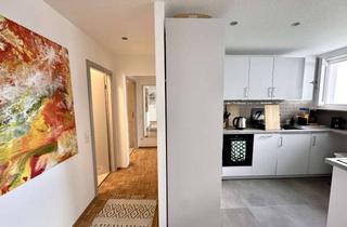 Wohnung kaufen in 55127 Lerchenberg, Helle, sanierte 3-Zimmer-Wohnung mit Einbauküche, Garage und Garten