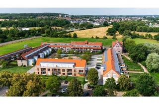 Wohnung kaufen in 35423 Lich, Schicke 2 Zi.-Gartenwohnung mit Golfplatz-Blick