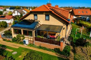 Haus kaufen in 04838 Doberschütz, Wohnen mit Perspektive – Separates Büro, Einliegerwohnung möglich, Wintergarten, Kamin & PV