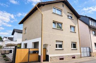 Haus kaufen in 65474 Bischofsheim, Voll vermietetes 3-Familienhaus auf WEG-geteiltem Grundstück *Verkauf im Bieterverfahren*