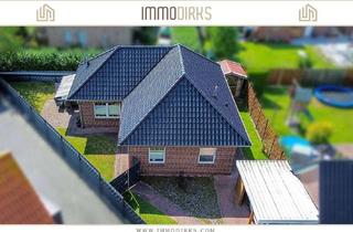 Haus kaufen in 26826 Weener, Weener:Moderner Bungalow mit Terrasse und Carport auf uneinsehbarem Grundstück