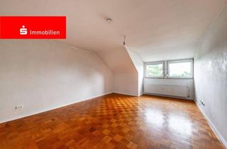 Wohnung kaufen in 63110 Rodgau, Rodgau-Nieder-Roden: Schöne Dachgeschosswohnung mit angenehmen Ambiente