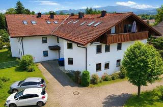 Wohnung kaufen in 83064 Raubling, Lichtdurchflutete 5 Zi.- Gartenwohnung mit zwei sonnigen Terrassen und großem Garten
