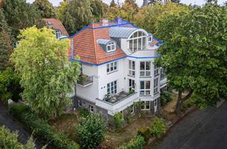 Wohnung kaufen in 34131 Bad Wilhelmshöhe, Besondere Architektur trifft stilvolles Wohnen - Dachgeschosswohnung am Mulang