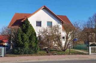 Doppelhaushälfte kaufen in 99752 Bleicherode, Zwei Häuser nebeneinander: 2 Doppelhaushälften mit Garten – Familienperspektive, vermietet