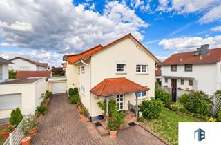 Haus kaufen in 55545 Bad Kreuznach, Viel Platz für zwei Generationen – Zweifamilienhaus mit Garten, Teich, Doppelgarage und PV-Anlage