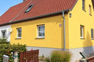 Doppelhaushälfte kaufen in 04886 Zwethau, Gepflegte Doppelhaushälfte mit Garage, Carport und Garten