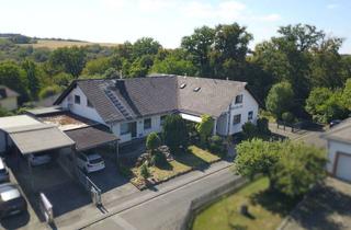 Haus kaufen in 35796 Weinbach, Großzügiges Zweifamilienhaus mit Einliegerwohnung am Waldrand in Weinbach