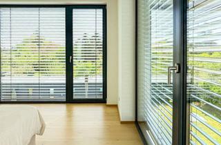 Einfamilienhaus kaufen in 63075 Rumpenheim, ARCHITEKTUR TRIFFT LEBENSQUALITÄT | Exklusives, hocheffizientes Einfamilienhaus in direkter Mainlage