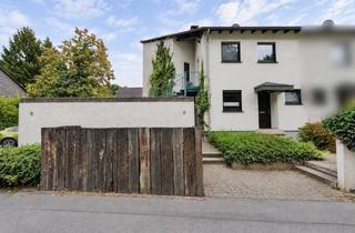 Haus kaufen in 40724 Hilden, Wohnkomfort auf zwei Ebenen – Zweifamilienhaus mit Garten, Balkon & Kamin