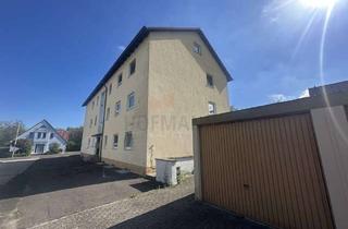 Anlageobjekt in 97714 Oerlenbach, Wohn.-u. Geschäftshaus mit 5 Wohnungen und 1 Gewerbeeinheit, Parkplatz, 5 Garagen, gr. Grundstück