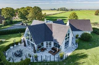 Anlageobjekt in 26409 Wittmund, Einzigartig wohnen – Charakterstarkes Viergiebelhaus mit hochwertiger Ausstattung