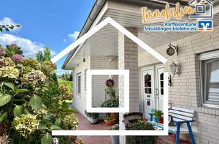 Haus kaufen in 26842 Ostrhauderfehn, Bungalow mit besonderem Plus – Wohnmobilcarport und viel Wohnqualität