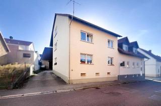 Haus kaufen in 76646 Bruchsal, Vermietetes Zweifamilienhaus mit Scheune und Hof auf einem 382 m² großem Grundstück