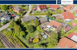 Einfamilienhaus kaufen in 26529 Osteel, Ihr Projekt mit Potenzial: Familienhaus, Garage & Werkstatt bieten viel Raum zur Entfaltung
