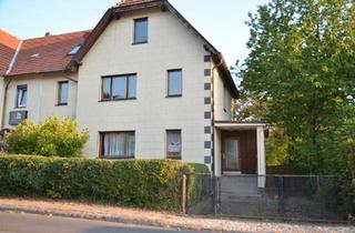 Doppelhaushälfte kaufen in 99885 Ohrdruf, Ohrdruf - Fachwerkhaus mit großer Werkstatt, 2 Garagen und eigener Einfahrt