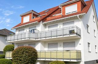 Wohnung kaufen in Im Sauerborn 40, 61184 Karben, Charmante 2,5-Zimmer-Wohnung mit großzügiger Sonnenterrasse