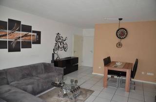 Wohnung kaufen in 67346 Speyer, Charmantes Erdgeschossapartment mit Terrasse, Garten und eigener Garage