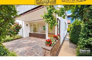 Wohnung kaufen in 82467 Garmisch-Partenkirchen, 3,5-Zimmer-Garten-Wohnung ca. 88 m², eigener Eck-Garten, Terrasse, Ost-Süd-Lage, großer Keller, PKW-
