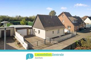 Einfamilienhaus kaufen in 52134 Herzogenrath, Familienidylle in Merkstein – Charmantes Einfamilienhaus mit großem Garten und zwei Garagen