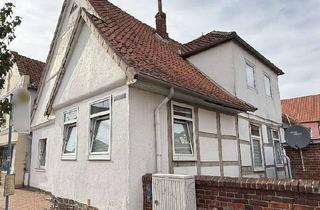 Haus kaufen in 31592 Stolzenau, Vermietetes Zweifamilienhaus mit Charme und Potenzial in zentraler Lage von Stolzenau!