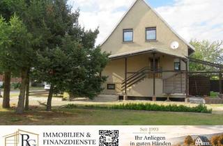 Haus kaufen in 39646 Oebisfelde, Gepflegte DHH mit guter Raumaufteilung und 2 Garagen auf einem Eigentumsgrundstück in zentraler Lage