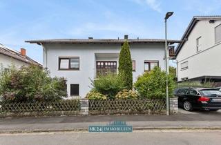 Haus kaufen in Im Wiesgarten, 35463 Fernwald, Immobilie mit Perspektive – großzügiges Wohnhaus mit 3 Wohneinheiten| Garten| Garage