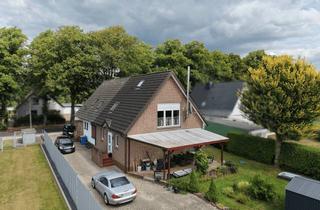 Doppelhaushälfte kaufen in 25436 Tornesch, Zwei Häuser, Ihre Chance in Tornesch: Neu und Alt als Doppelhaushälften-Paket