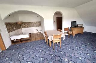 Wohnung kaufen in 32602 Vlotho, Helle Dachgeschosswohnung mit Westbalkon, Weitblick und Carport in Vlotho-Uffeln