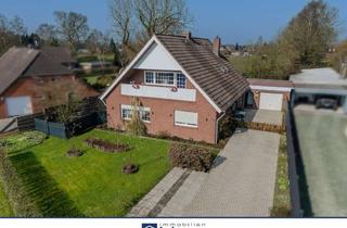 Einfamilienhaus kaufen in 26629 Großefehn, Großzügiges Einfamilienhaus in idyllischer Kanallage von Mittegroßefehn