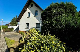 Haus kaufen in 36251 Bad Hersfeld, Großzügiges Wohnhaus mit zwei Wohneinheiten, drei Balkonen und idyllischem Garten
