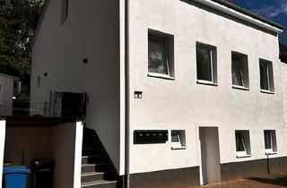 Mehrfamilienhaus kaufen in 66450 Bexbach, Bexbach - Kern sanierte Kapitalanlage mit fünf Apartments Gartenanteil