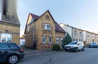 Einfamilienhaus kaufen in 06808 Bitterfeld-Wolfen, Bitterfeld-Wolfen - Einfamilienhaus mit Garten & viel Potenzial in Holzweißig